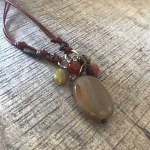 Leather like adjustable cord necklace with glass beads and stone charm